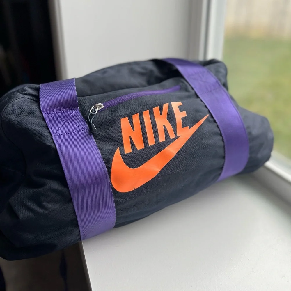 Nike Black and Orange Duffel Bag with Purple Straps - Picture 1 of 3